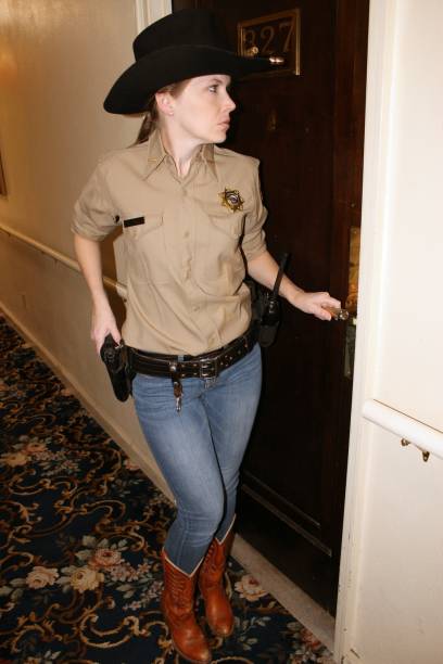 istock Female Western Deputy Sheriff 1371376153