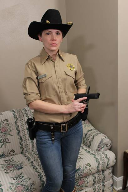 istock Female Western Deputy Sheriff 1371376159