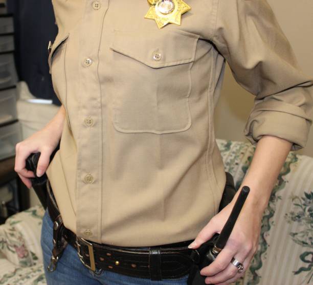istock Female Western Deputy Sheriff 1371376681