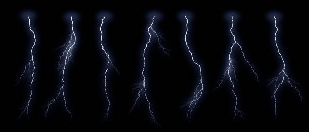 istock Set of different lightning bolts isolated on black background 1371385916
