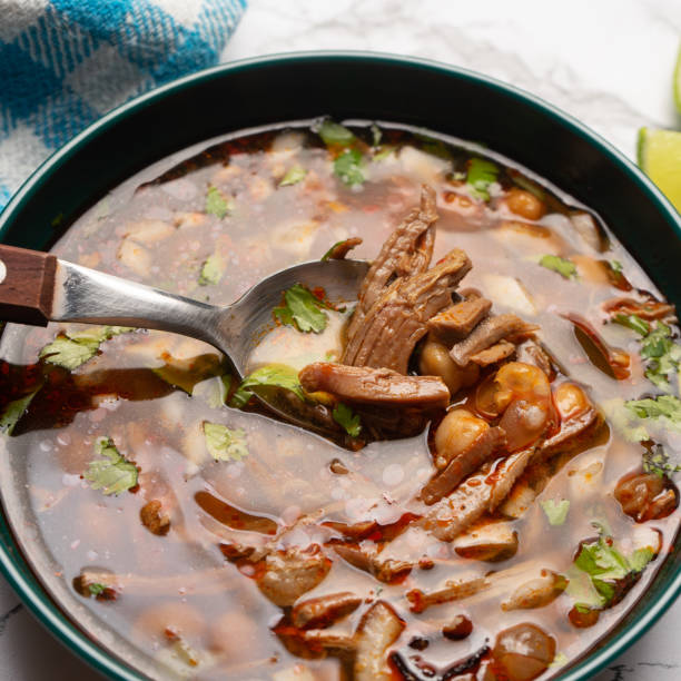 istock Beef birria consomme with chickpeas. Mexican food 1371386335