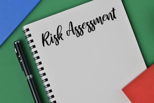 istock Notebook written with text RISK ASSESSMENT. Business concept. 1371388036