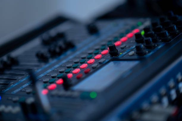 istock sound check for concert, mixer control, music engineer, backstage 1371401194
