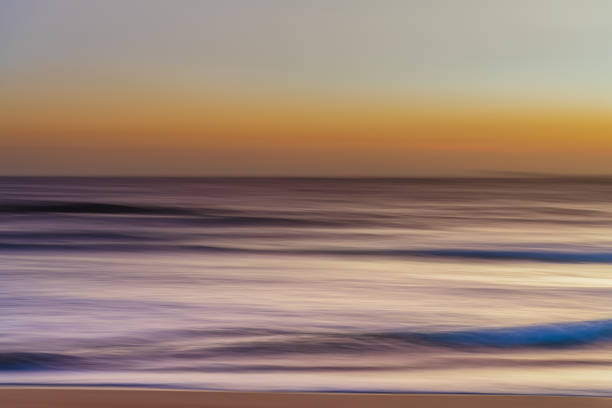 istock Orange glow panning sunrise seascape 1371409573