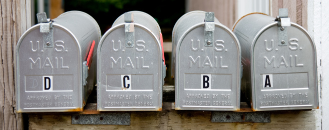 Four classic U.S mailboxes await delivery in Ketchikan, Alaska.