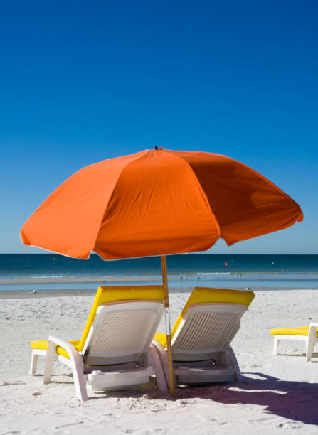 istock Beach Umbrella and Lounge Chair 137142721