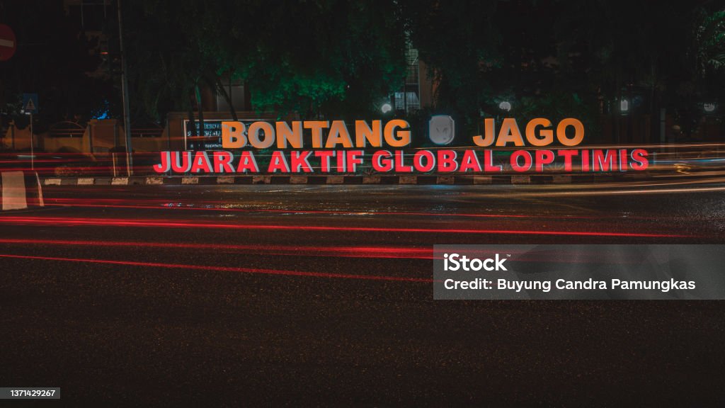 Bontang lighttrail the atmosphere of the night lights in the city of bontang Blurred Motion Stock Photo