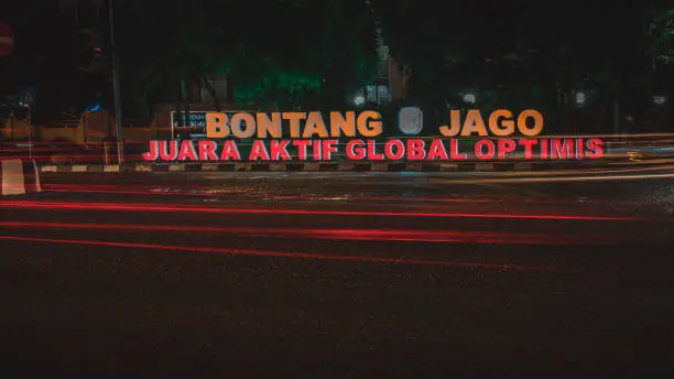 the atmosphere of the night lights in the city of bontang