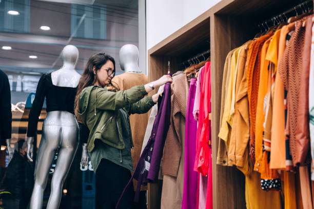 Woman shopping for clothes stock photo