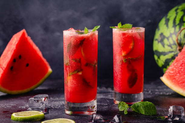 istock Watermelon alcoholic or non-alcoholic cocktail, mojito cocktail with mint and lime. 1371446424