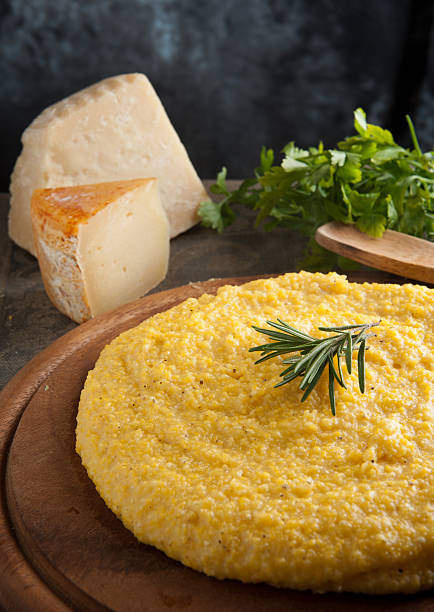 Yellow polenta on wooden table
