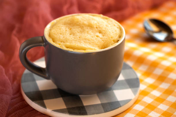 istock cake mug. Easy, fast to cook.vanilla biscuit in a spoon 1371464477