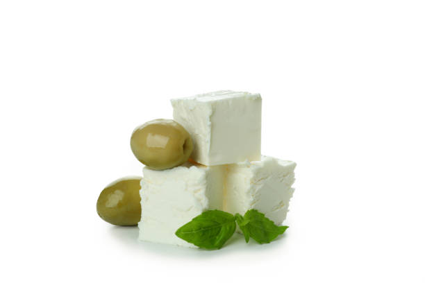 istock Feta cheese pieces isolated on white background 1371467338