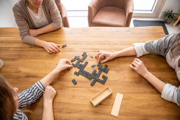 Women playing dominoes at Home