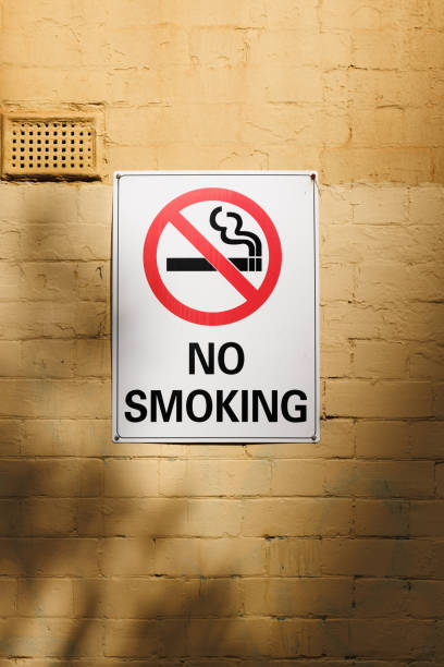 istock No smoking sign on a brick wall 1371473818