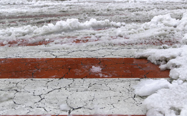 istock Snowy street with markings 1371476491