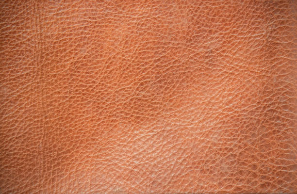 istock Genuine leather texture background. Dark brown, orange textures for decoration blank. Vintage skin natural suede with design line pattern or red abstract can use wallpaper or backdrop luxury event. 1371479345