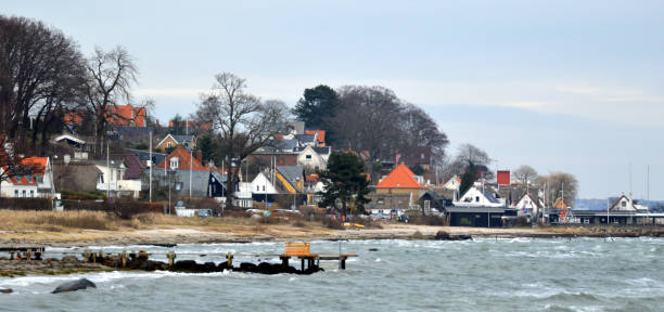 Snekkersten is a former fishing village and situated in the southern part of Helsingør, Denmark. The name Snekkersten was first recorded in 1582. This part of Snekkersten has become a fashionable neighborhood. Housing prices have increased to record-high levels in all the Nordic countries during the coronavirus crisis. The photo was taken in Skotterup, Snekkersten, Denmark on February 13th, 2022 Friday afternoon.