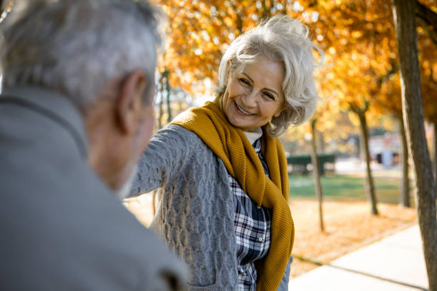 istock Senior couple in park 1371482026