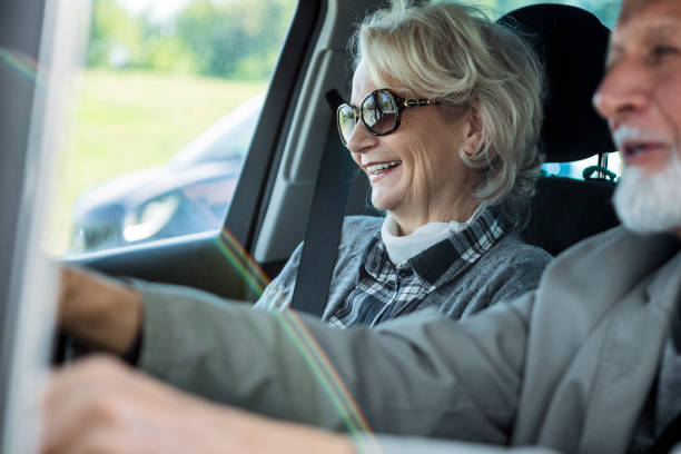 istock Senior couple driving 1371482453