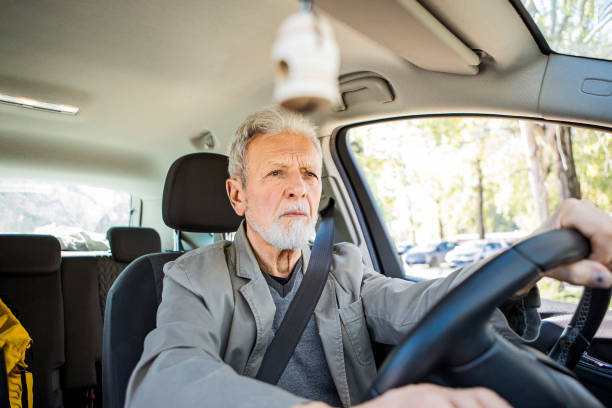 istock Senior Driving a Car 1371482931