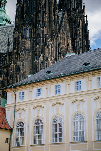 Detailed view on gothic St. Vitus cathedral and Imperial Stables in Prague Castle, Prague, Czech Republic. May 26, 2020