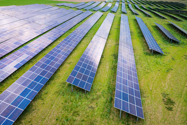 istock Big and blue photovoltaic farm as a renewable energy source. 1371490544