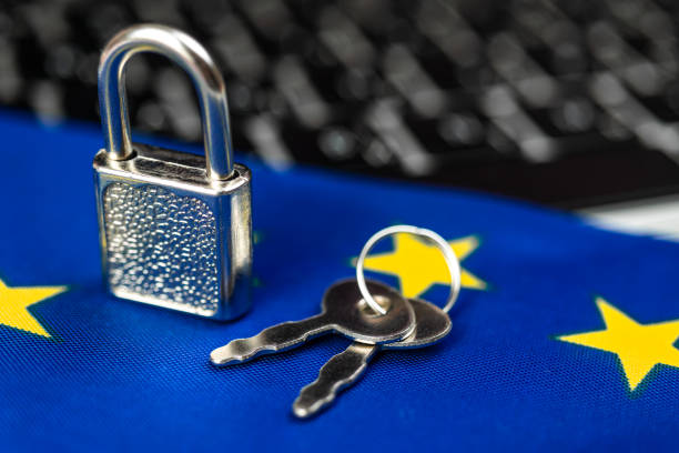 istock Europe cyber security concept. Padlock on computer keyboard and EU flag. Close-up view photo 1371491869