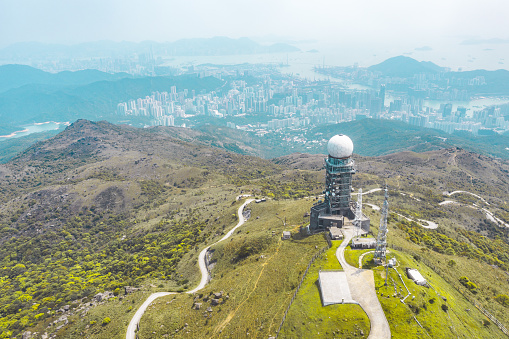 Tai Mo Shan radar station.Tai Mo Shan is the highest peak in Hong Kong, with an elevation of 957 metres