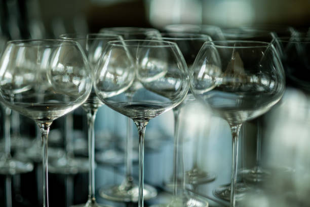 istock champagne glass, celebration, empty glass on the table 1371492808