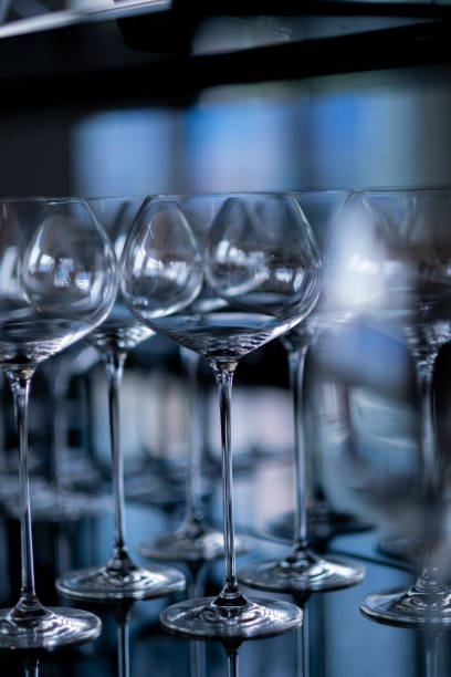 istock champagne glass, celebration, empty glass on the table 1371492819