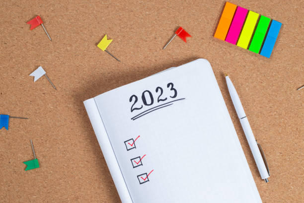 istock Copy space for 2023 Goals in notebook plan listing of new year goals 1371496354