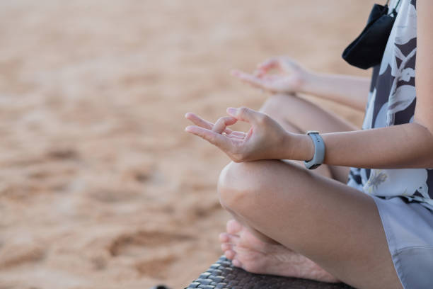 istock doing yoga sitting on floor 1371499188