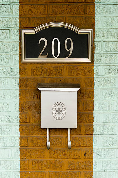 istock mail box slot 209 on brick wall 137149990