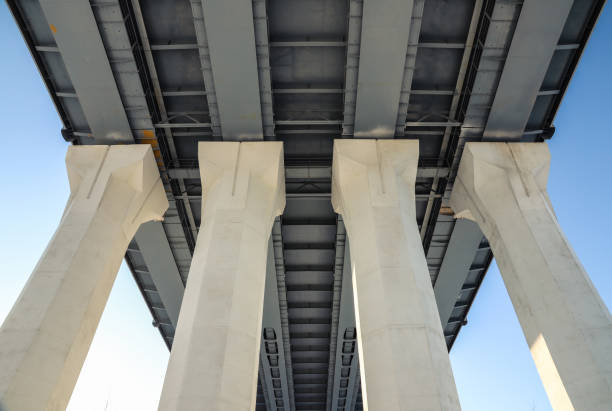 istock Four road bridge supports close-up. Engineering and architecture. Outdoors 1371504570