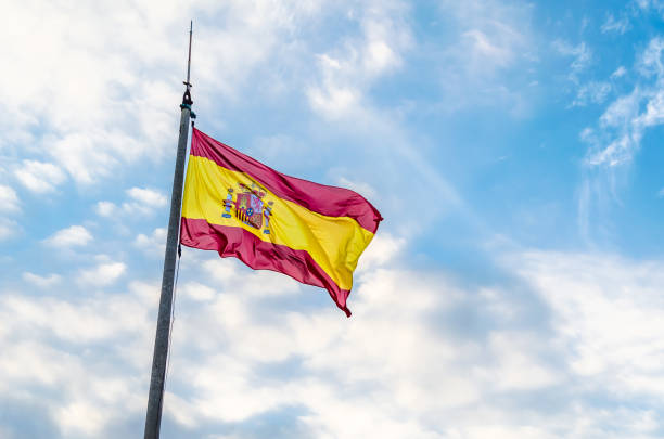 istock Spanish flag waving in the wind 1371507013