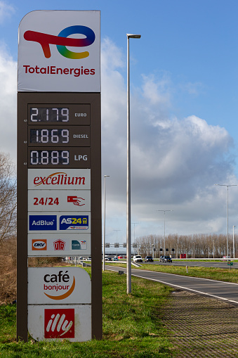 Harmelen, province Utrecht, Netherlands, february 5th 2022, sign at the junction to TotalEnergies gas station 