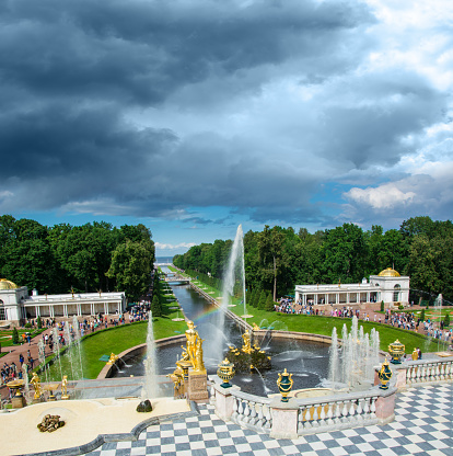 Peterhof, Russia - July 13, 2016: View from Grand Peterhof Palace to Lower park with fountains, golden statues and channel.