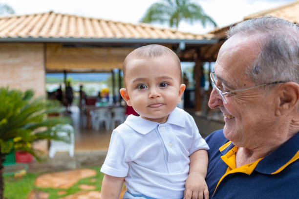 grandpa laughing at your grandson's faces