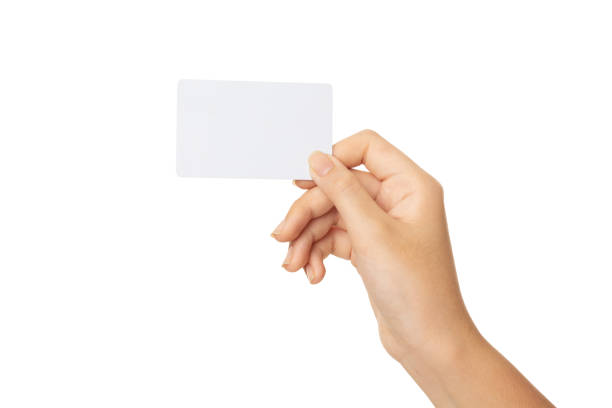 business woman hand holding business card isolated on white background with clipping path stock photo