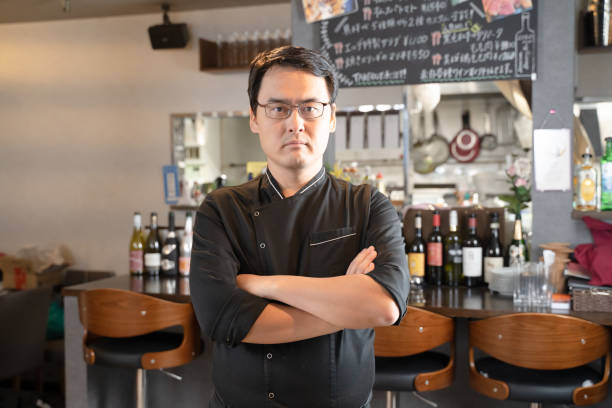istock A man who runs a restaurant with his arms folded 1371516710