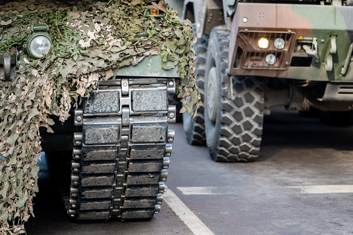 NATO or North Atlantic Treaty Organization armored crawler tanks and other military vehicles