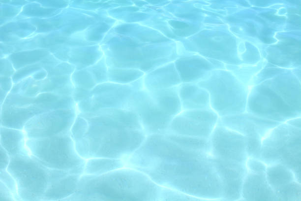 istock Clear bluish water in the sea. Top view. Close-up. Background. Texture. 1371519049