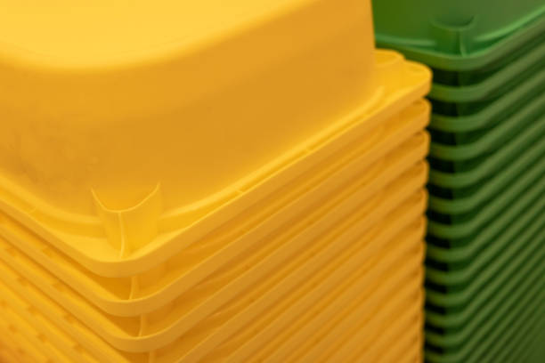 An abstract pattern of yellow and green boxes stacked together