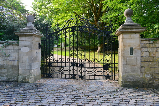 Old Ornate Gate and Driveway of an English Country Estate