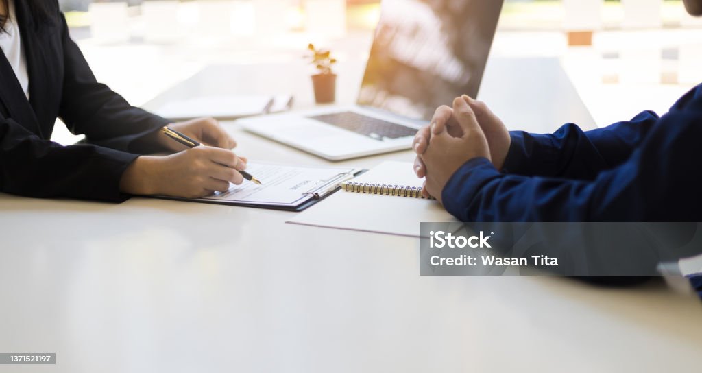 Negotiating business and signing a contract. Lawyer concept and legal advisor. Recruitment Stock Photo
