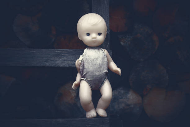 istock Old broken abandoned doll. Happy Halloween. Close-up. Background. Texture. 1371521990