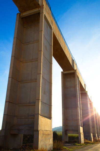 istock Modern concrete aqueduct that transports water to irrigate the fields 1371525965