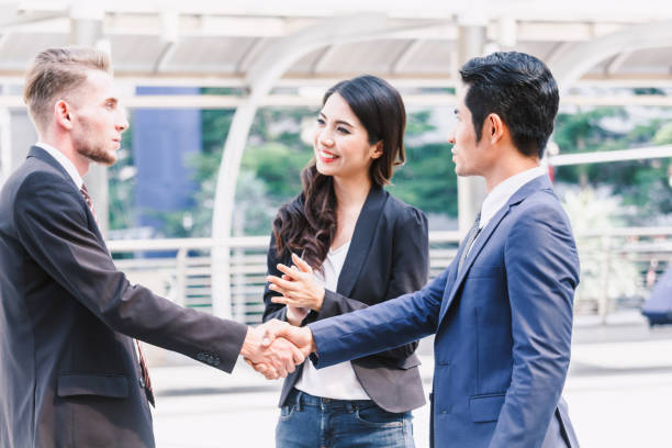 istock Handshake of business partners 1371527797