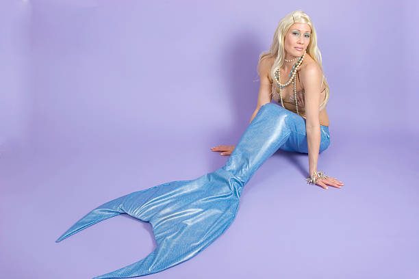 istock Mermaid against Purple background 137153298